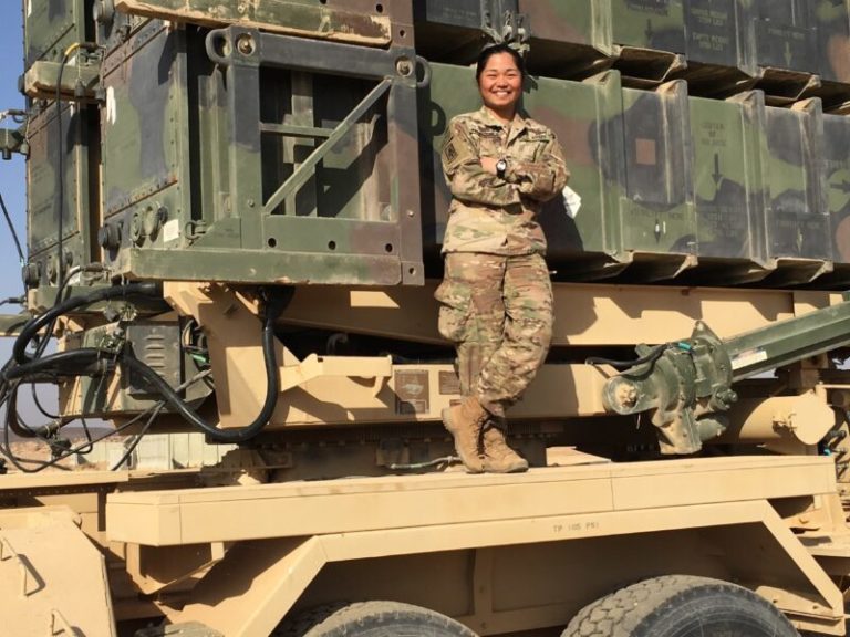 Army soldier with military vehicle