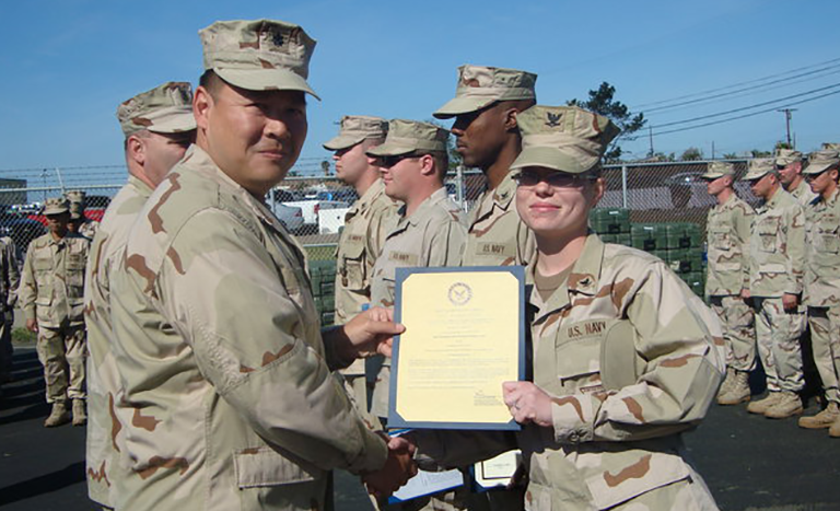 Jessica receives her official frocking letter as she advances to Third Class Petty Officer in the United States Navy.