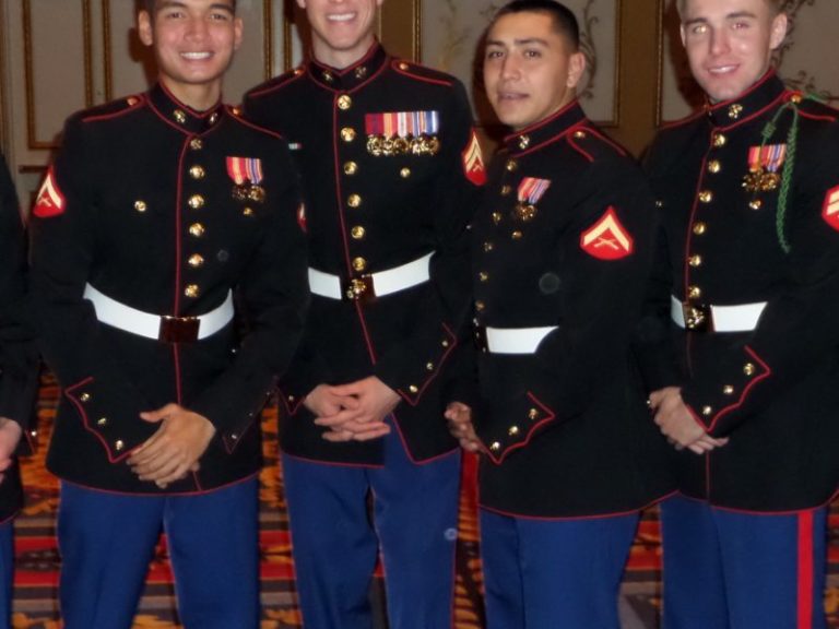 Ricardo Lunk and Marines in dress uniform.
