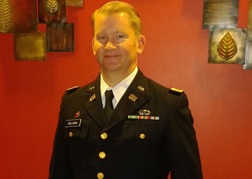 Bill Dallman poses in his Army dress uniform.