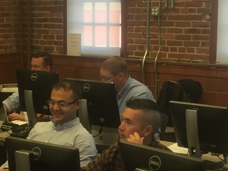 Group of MSSA students from Colorado Springs listening to their instructor.