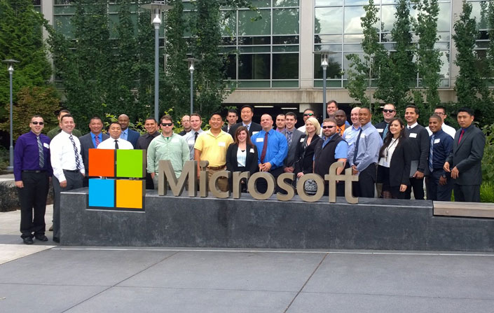 The sixth Microsoft Software & Systems Academy cohort from Joint Base Lewis-McChord is all smiles on a trip to the Microsoft campus.
