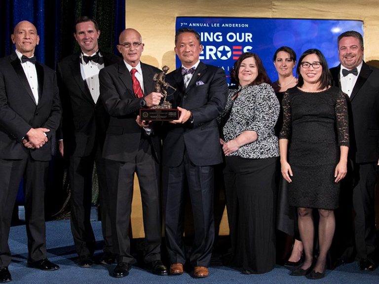 Military affairs team accept an award from the US Chamber of Commerce