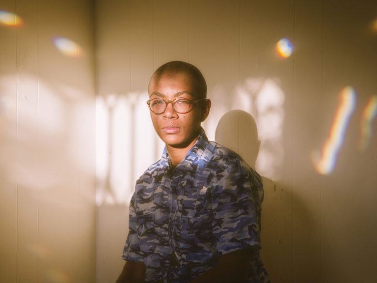 Soldier in transitioning artistic light