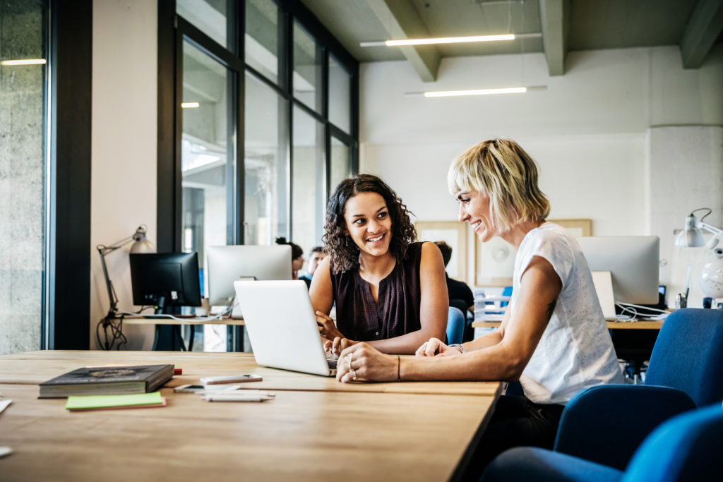 Casual start up businesswomen talking